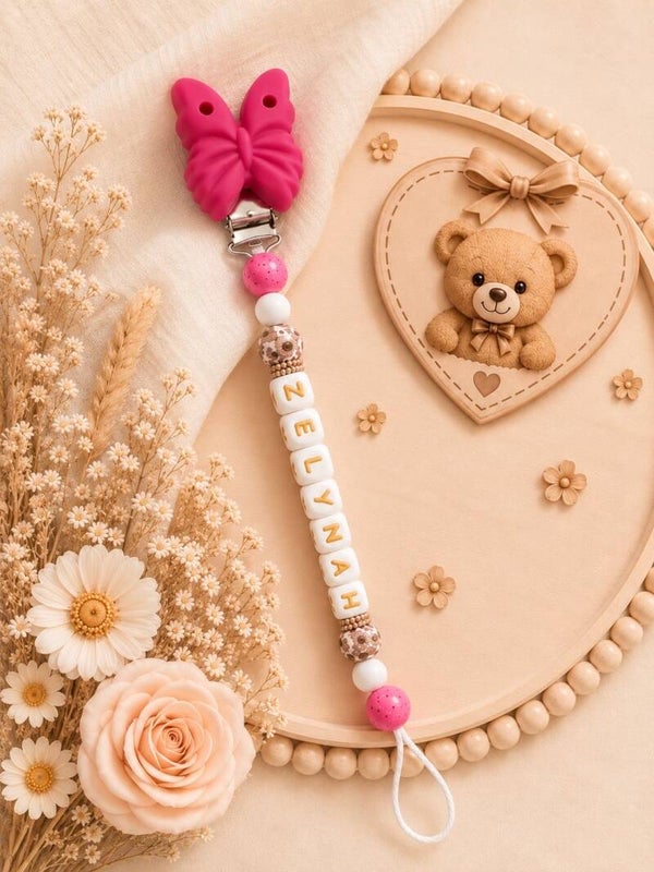 Attache tétine papillon