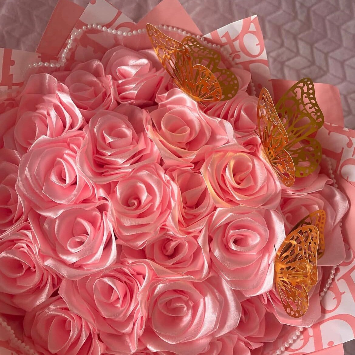 Pink satin bouquet with pearl and pink wrapping
