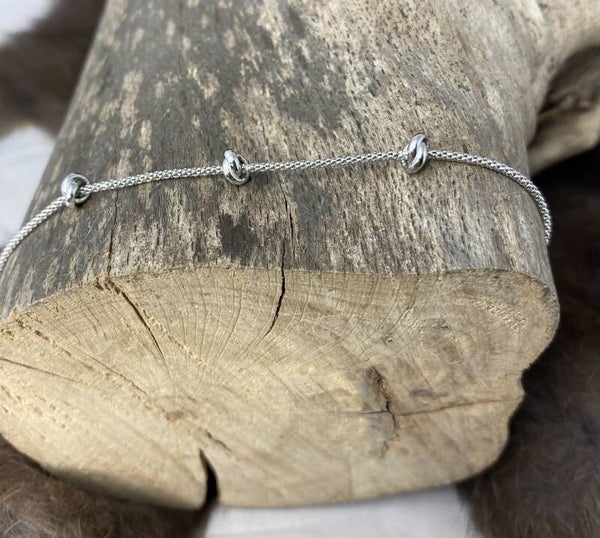 Zilveren armband met 3 knopen 1332245