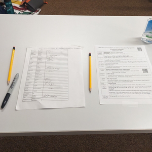Grant writing materials and funding guidelines on desk