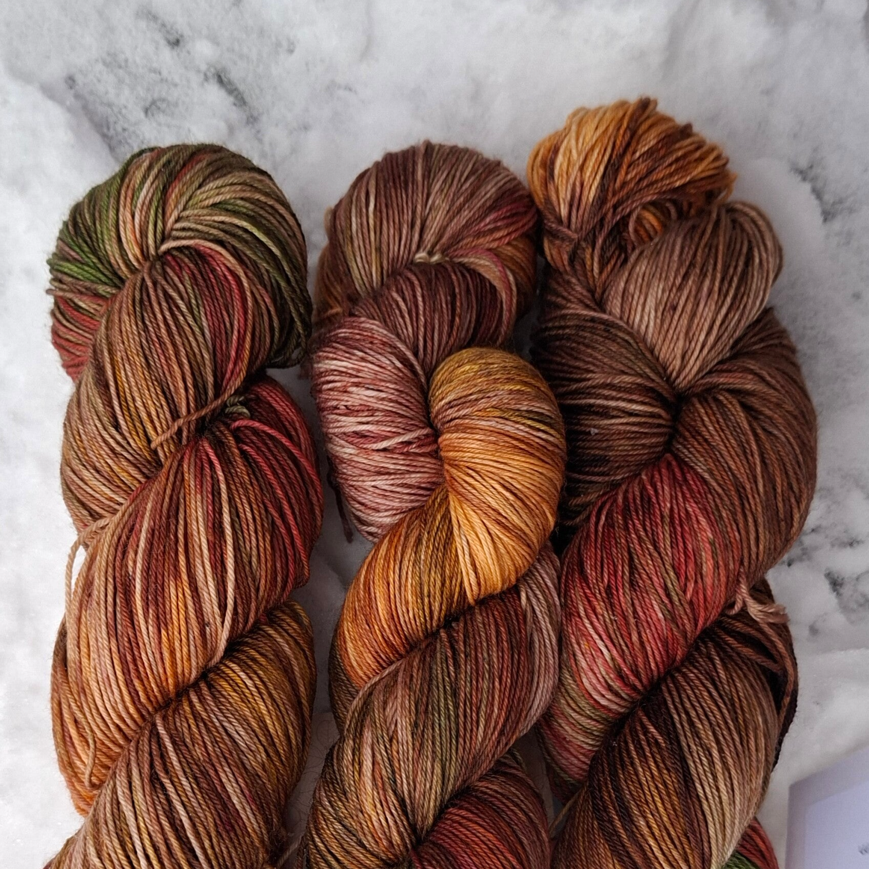 100 gram sokkenwol Jern Logo