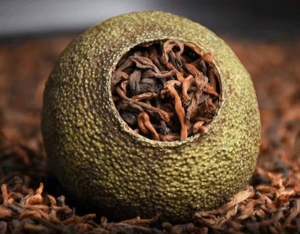 Xiao Qing Gan – Pu Erh Gevulde Mini Citrus