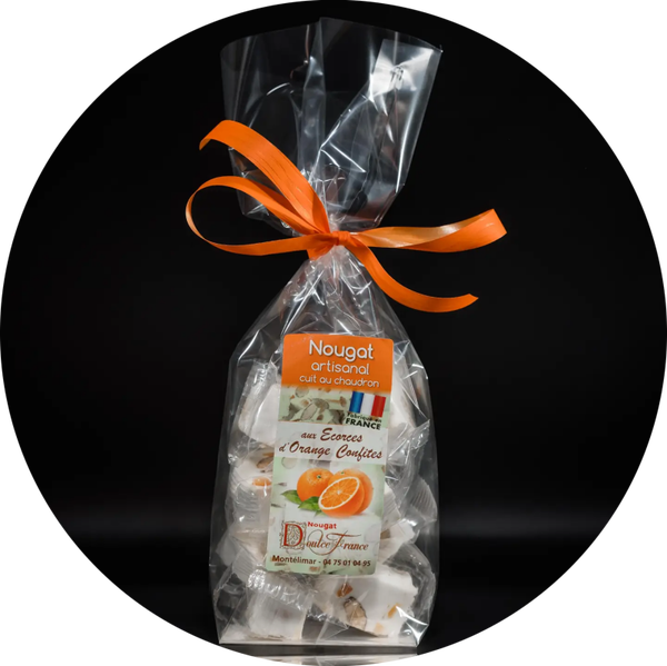 Zakje 100 g Nougat met gekonfijte sinaasappelschillen Verp 12