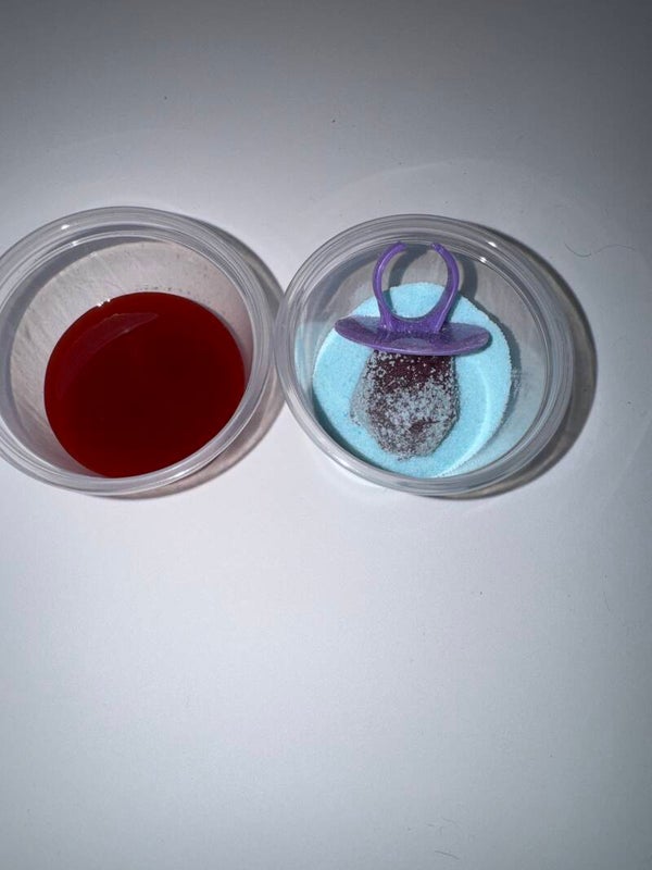 Ring pop with chamoy powder and chamoy