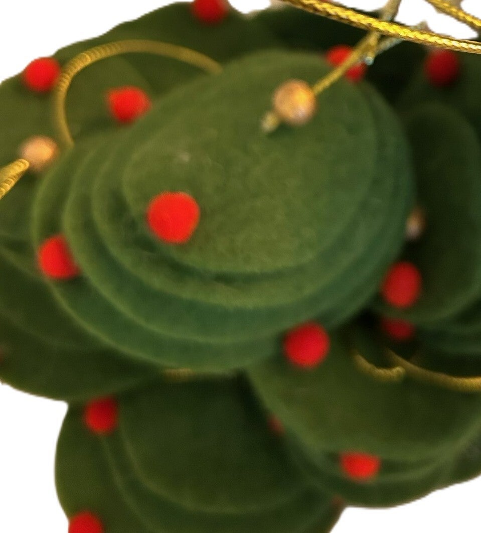 Groen blad vilt met rood en goud