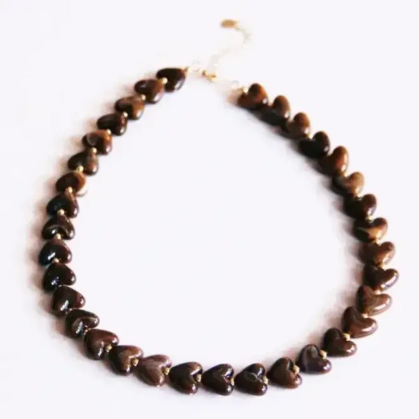 Kralen ketting van hartjes resin - bruin