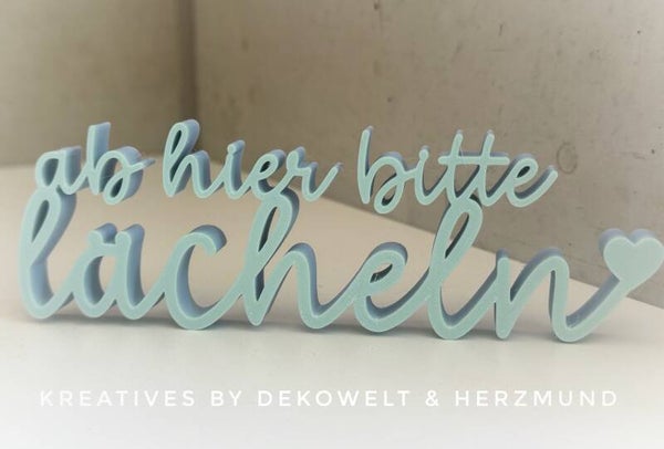 Schriftzug „lächeln“