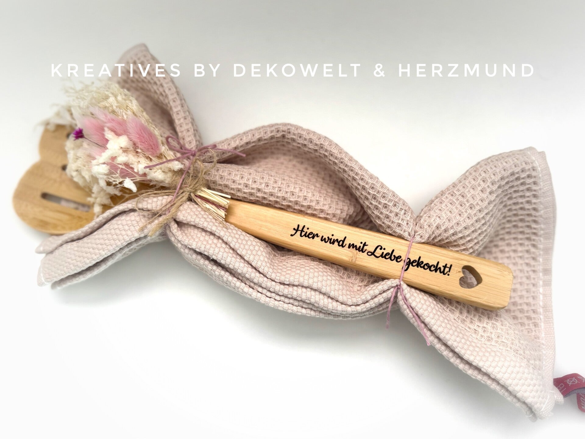 Herzkochlöffel mit Handtuch