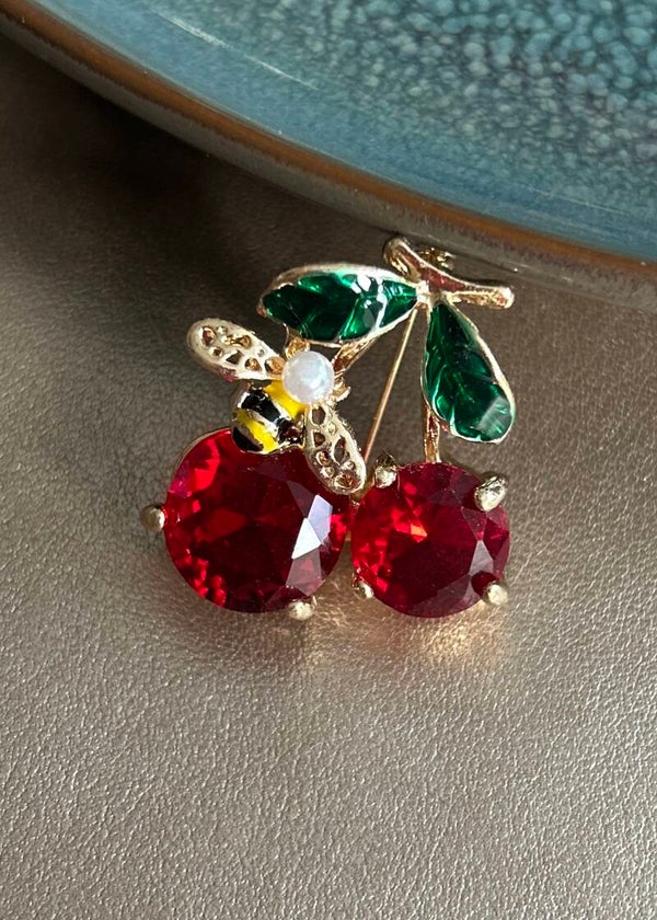 Broche Ziss - Kers met bij