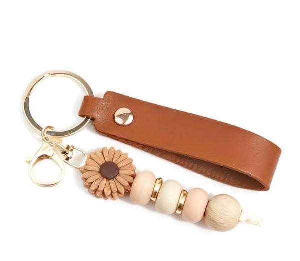 Sleutelhanger bloem bruin