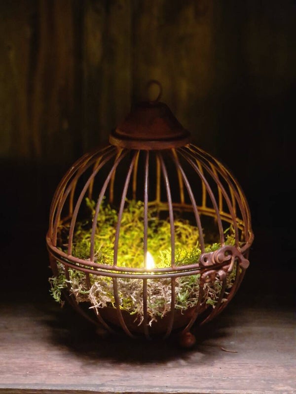 Grote hervulbare roestbol op pootjes