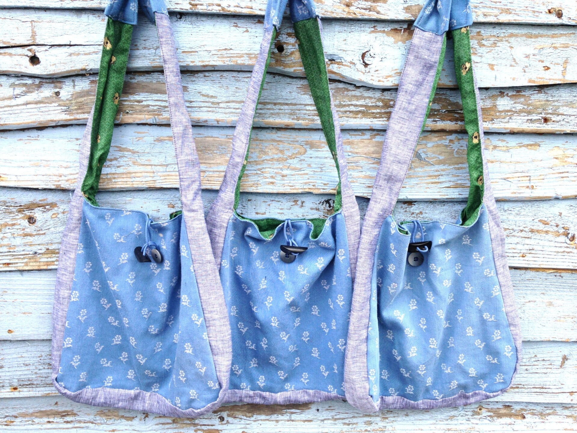 DAISY DENIM SLING BAGS