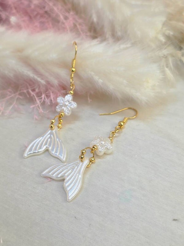 ​Boucles Sirène & Blossom – L'accessoire indispensable de votre été