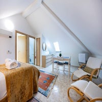 attic-bedroom-view-of-living-to-ceiling-window-standard.jpg