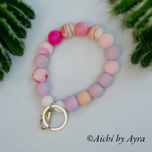 Armband sleutelhanger Roze/Lila/wit