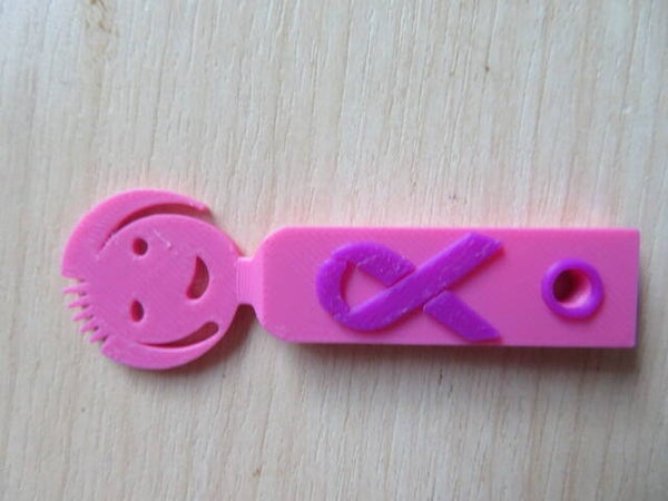 sifflet Octobre Rose