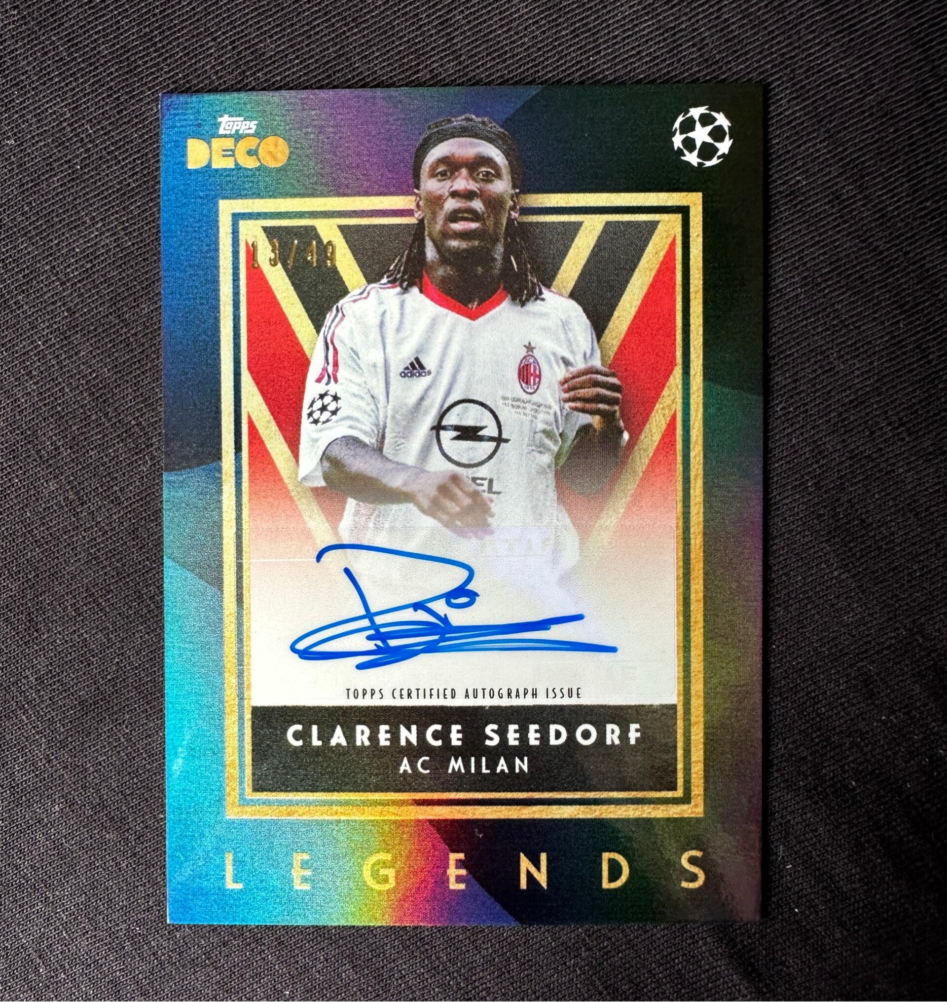 Clarence Seedorf /49 Auto Topps Deco UEFA Club Competition 2023/24 Blue Parallel