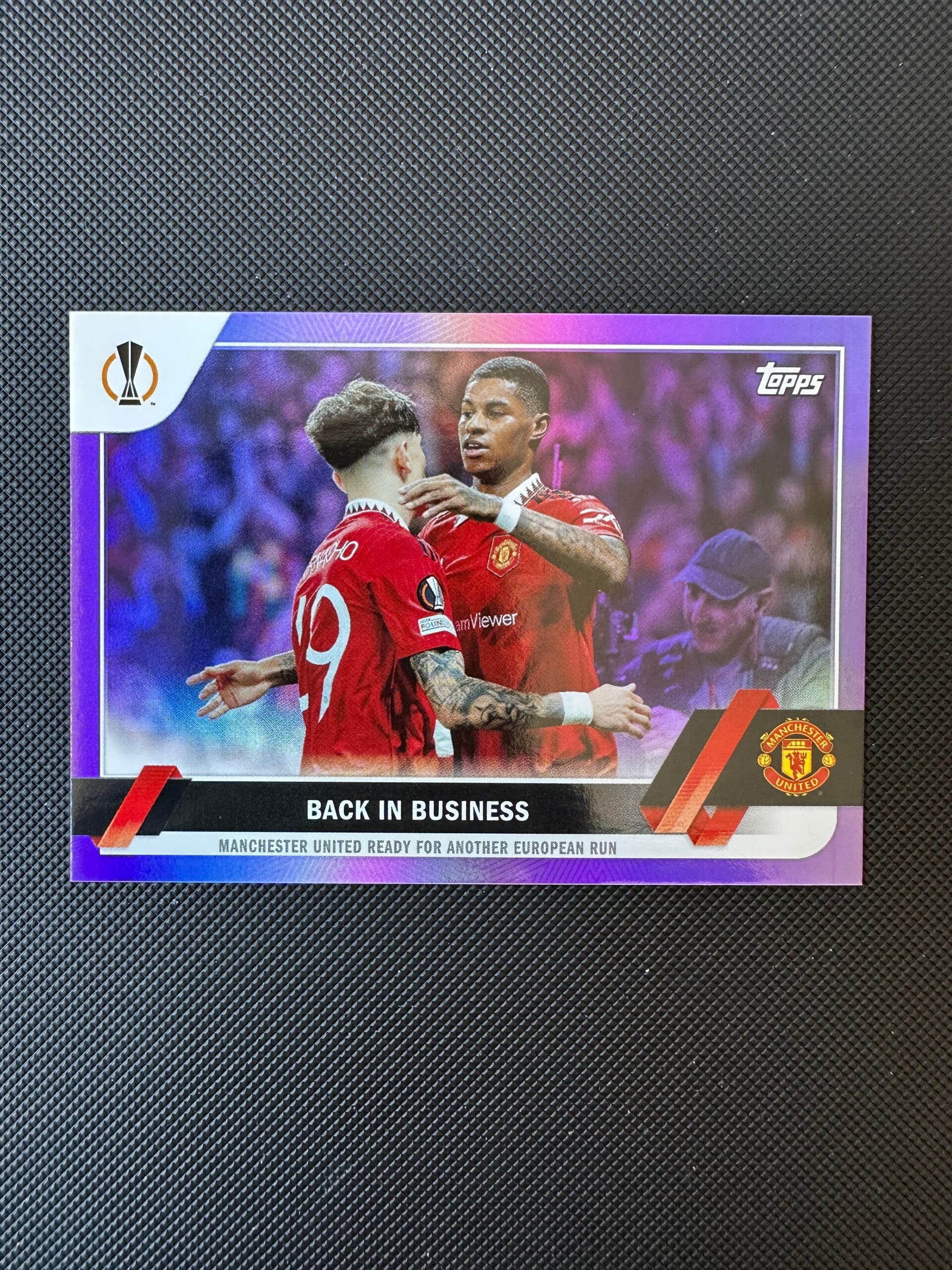 /75 Topps UEFA CC 2023 Back In Business- Purple Foil #163 MAN. UTD.