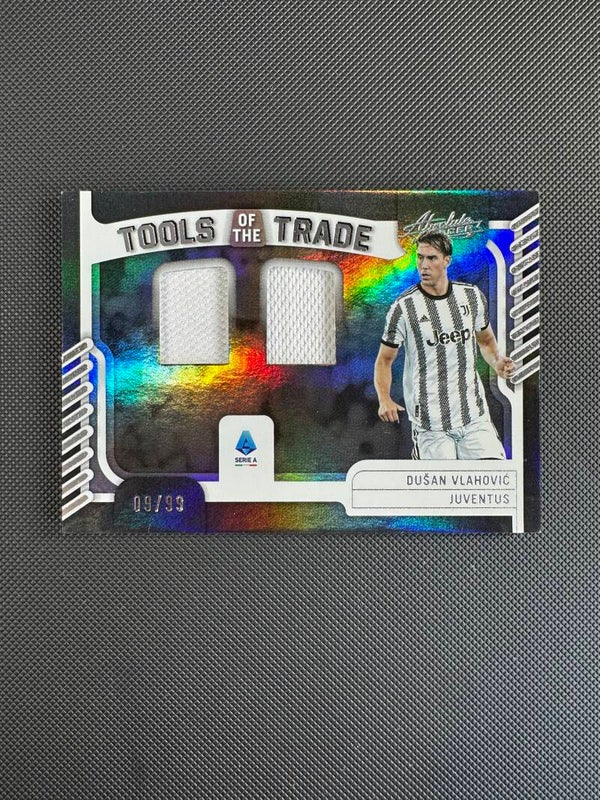 Dušan Vlahović /99 Dual-Patch Panini Chronicles Absolute Serie A 2022/23 Tools Of Trade #AT-DV