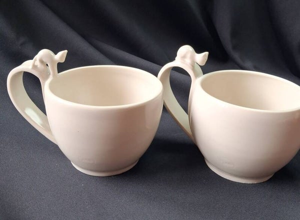 Duo de tasses en grés blanc