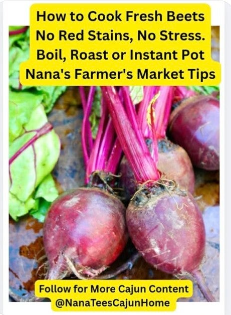 Bunch of fresh red beets with vibrant pink stems and green leaves on a wooden farmers market table, how to cook beets without stains tutorial from NanaTee's Cajun Home