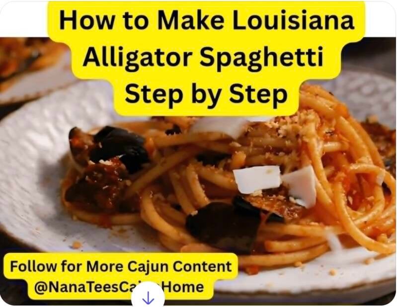 Plate of Louisiana alligator spaghetti with thick bucatini pasta in red gravy, dark tender chunks of gator meat, shaved parmesan, and toasted bread crumbs, church cookbook recipe from NanaTee's Cajun Home