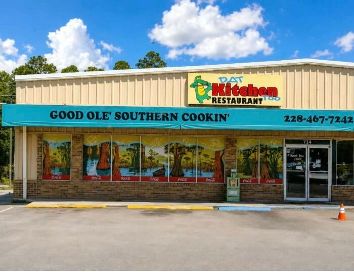 Dat Kitchen Too restaurant exterior with teal awning in Waveland, MS