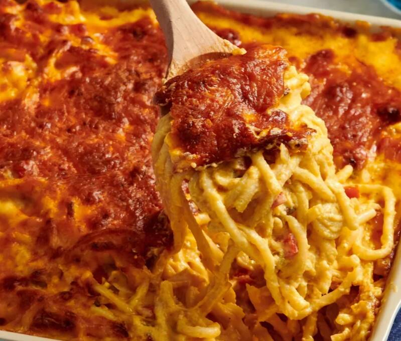 Baked New Orleans mac and cheese with smoked paprika crust in Pyrex dish using NanaTee’s mac and cheese kit with De Cecco bucatini