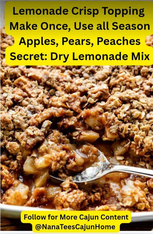 Golden brown lemonade crisp topping with oats and butter over bubbling baked apples in white baking dish, make-ahead freezer fruit crisp recipe for apples pears and peaches from NanaTee's Cajun Home