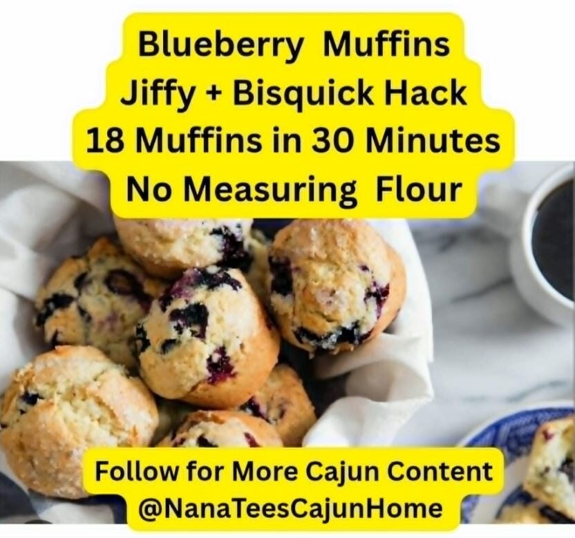 Basket lined with white cloth filled with golden blueberry muffins made with Jiffy mix and Bisquick, burst blueberries and sugar crystals on top, coffee cup and blue plate in background, easy 30 minute recipe from NanaTee's Cajun Home