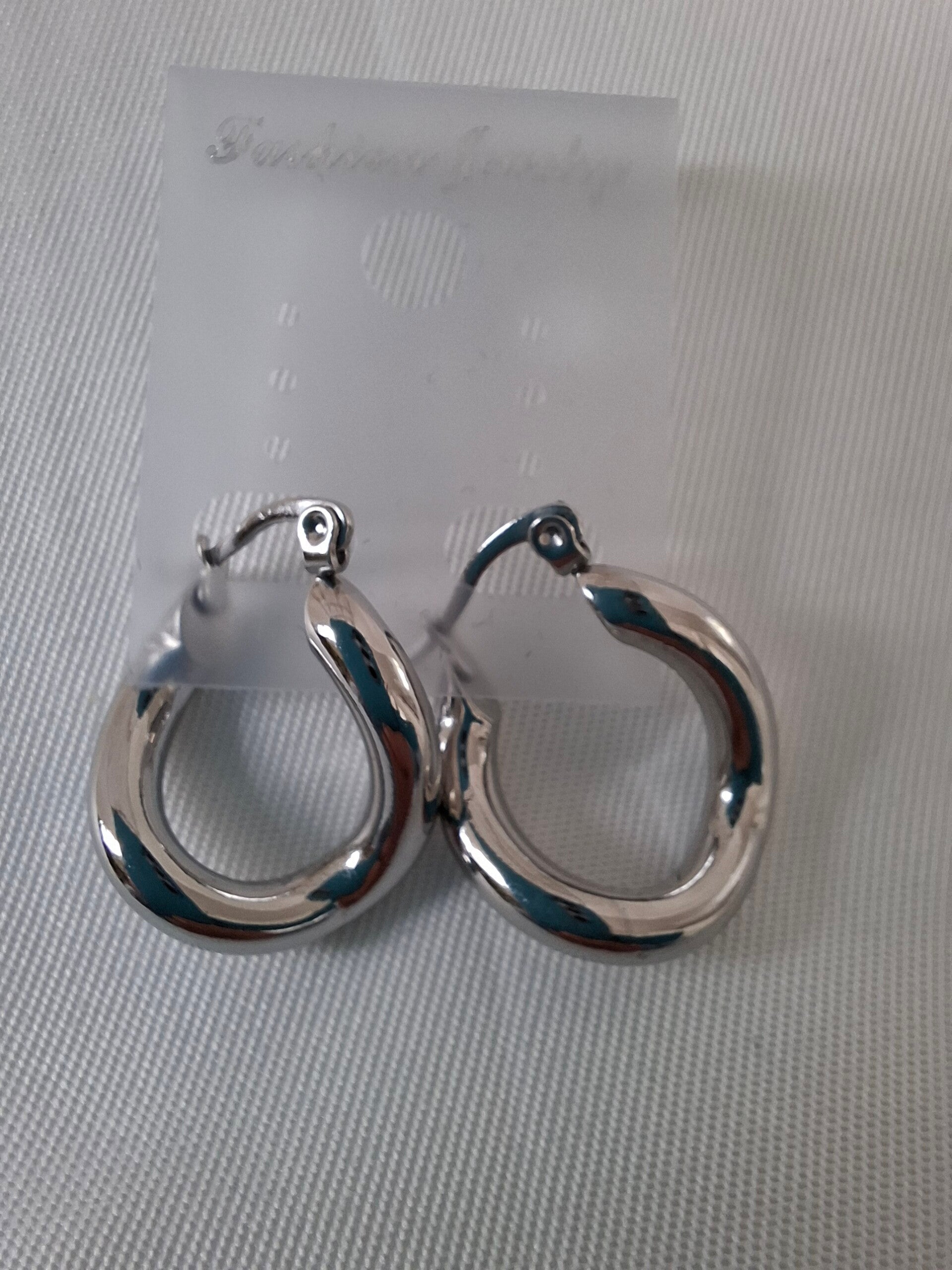 zilver twist oorringen