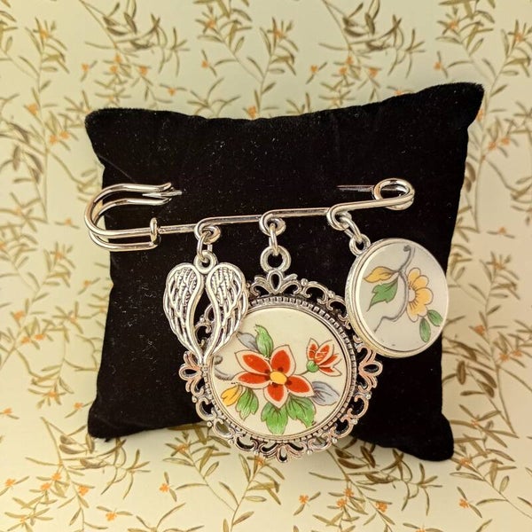 Epingle porte-bonheur "oiseau de paradis"
