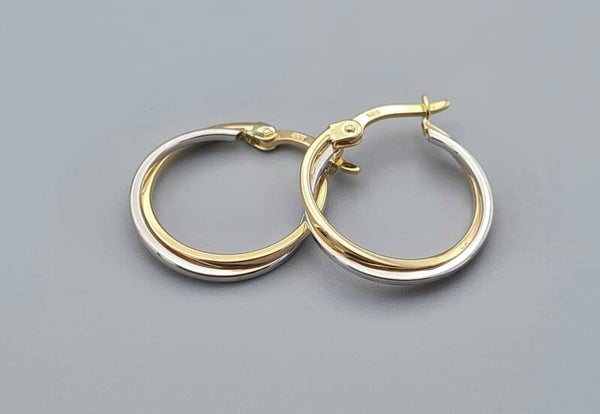 Gouden bi- color creolen. 2022/771.