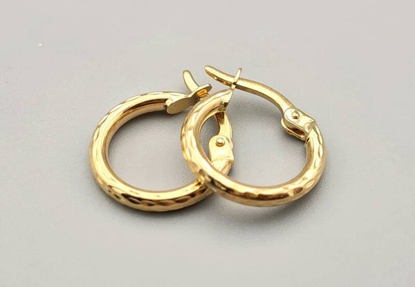 Gouden creolen. 2022/876.