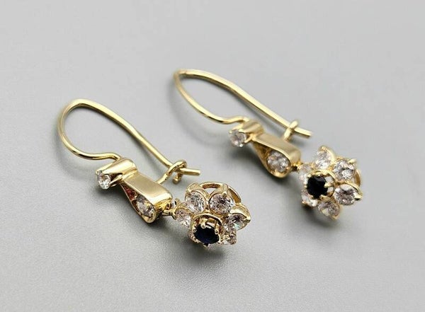 Vintage oorbellen met saffier en zirkonia's. 2024/63