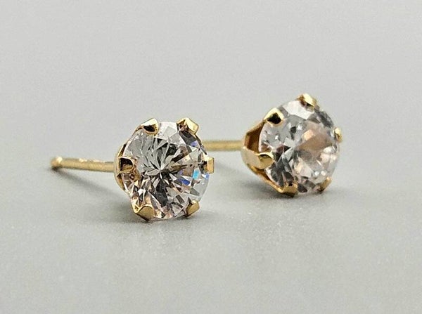 Gouden vintage oorbellen met edelsteen bergkristal. 2024/156.