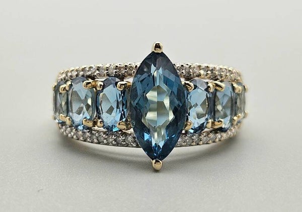 Vintage ring met edelsteen topaas en diamant. 2024/180.