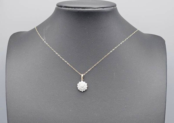 Vintage ketting met gouden hanger met diamant. 2024/297.