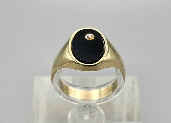 Vintage gouden zegelring met edelsteen onyx en diamant. 2025/307.