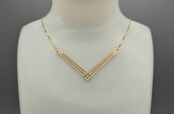 Vintage gouden ketting met 3 kleuren goudenhanger. 2025/415.