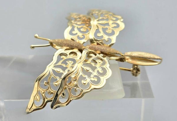 Gouden vintage broche gemaakt als een Libelle. 2025/537.