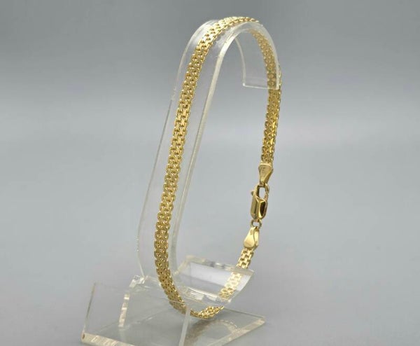 Gouden vintage fantasie schakel armband. 2025/647.