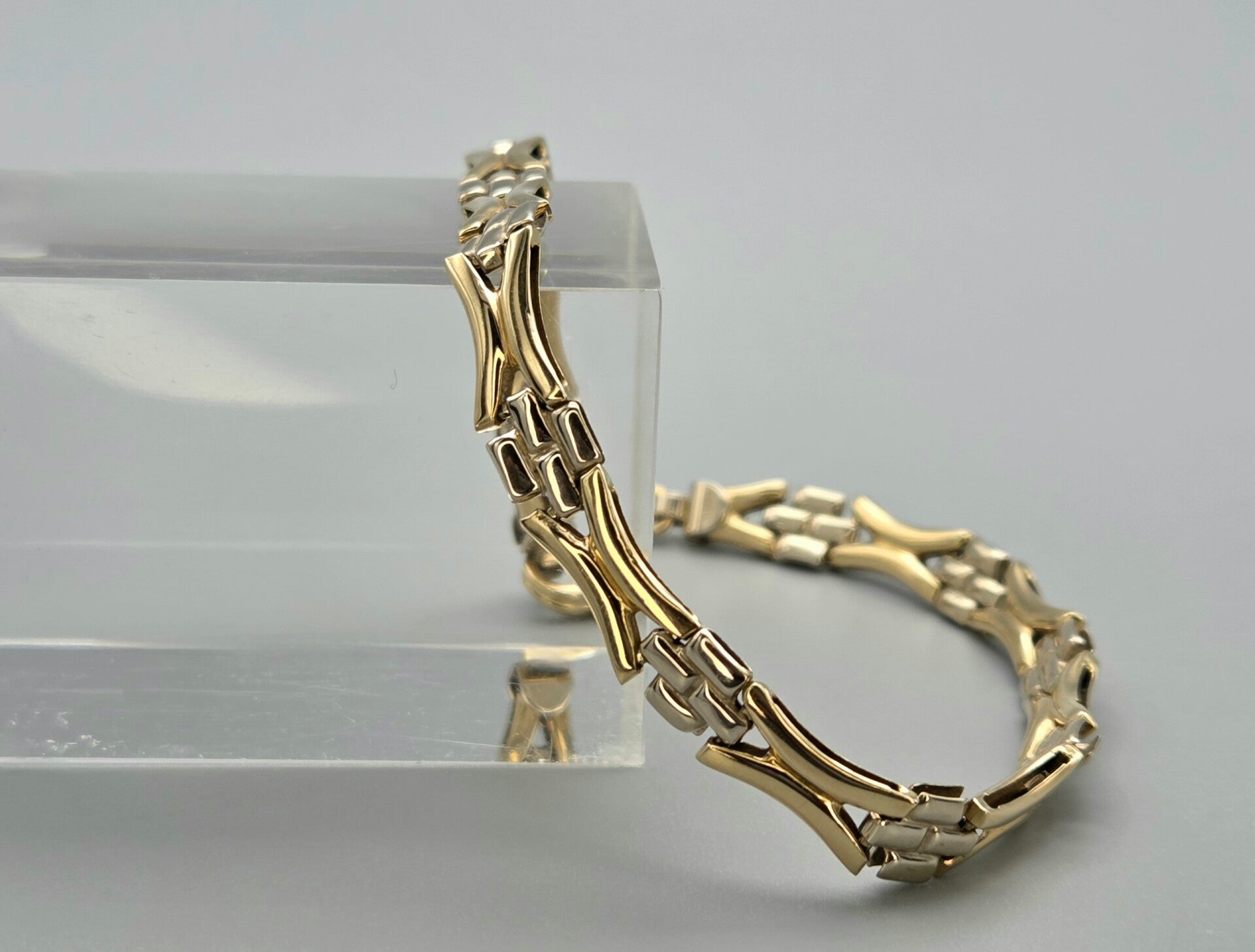 Gouden vintage bi-color fantasie schakel armband. 2025/791.