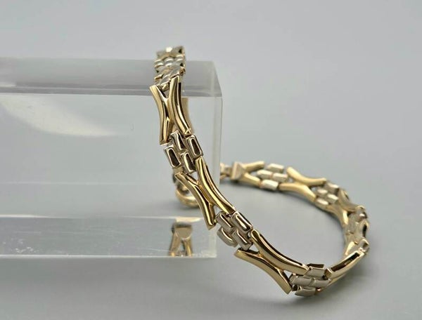 Gouden vintage bi-color fantasie schakel armband. 2025/791.