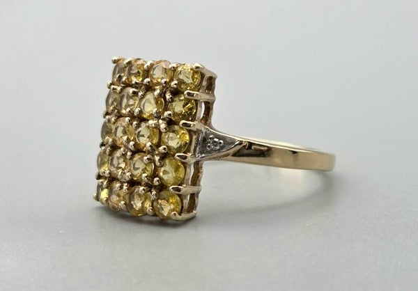 Vintage ring met gele edelsteen saffier en diamanten. 2025/813