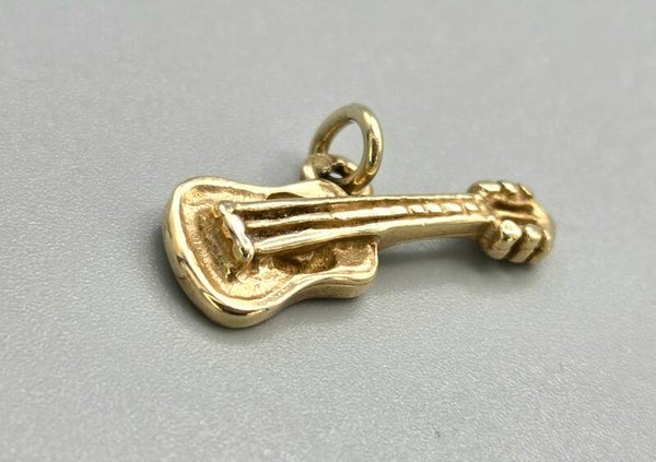 Gouden muziek gitaarhanger. 2026/175.