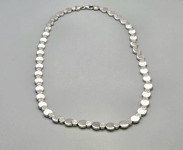 Zilveren bolletjes ketting met zirkonia's. 2026/194