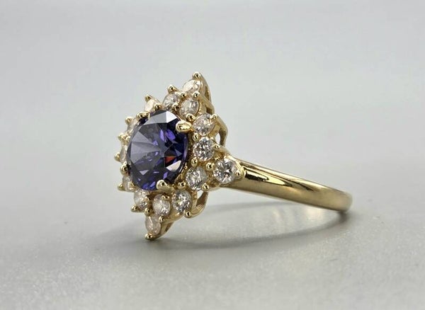 Vintage ring met edelsteen tanzaniet en zirkonia. 2026/234.