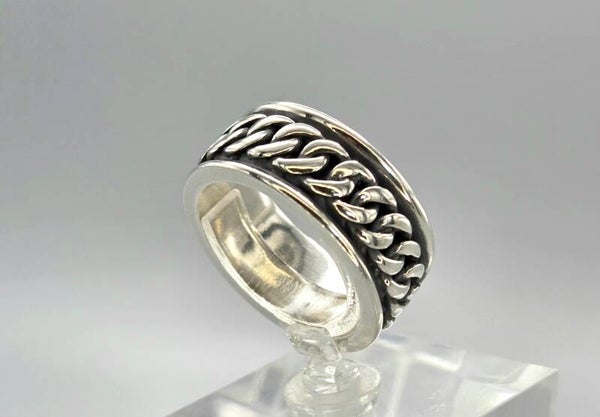 Zilveren ring met gevlochten gourmetschakel onyx. 2026/259.