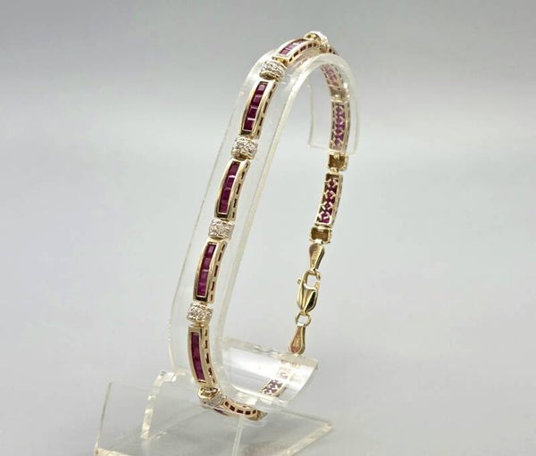 Vintage tennisarmband met edelstenen robijn en diamant. 2026/290.